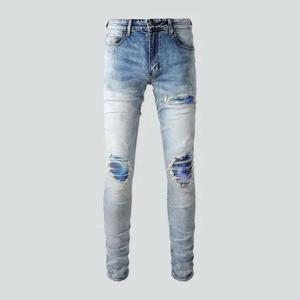 Light-wash distressed jeans